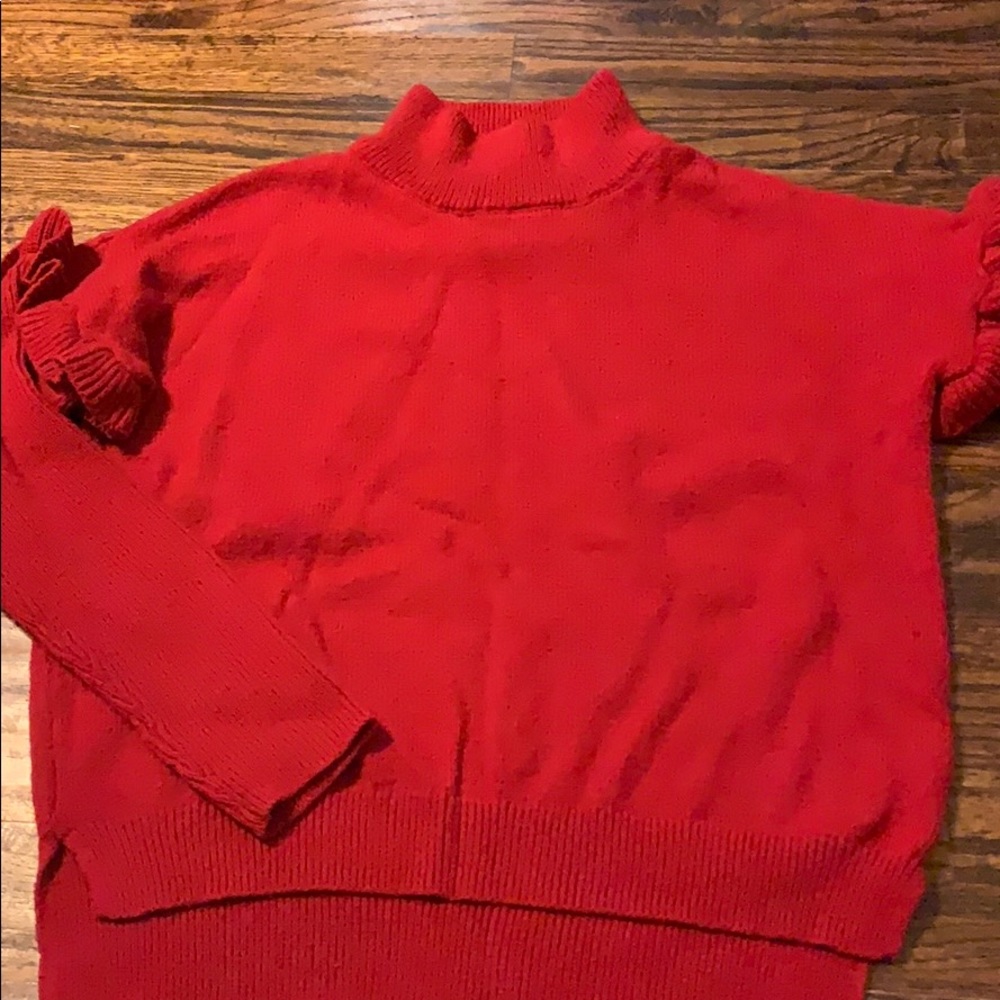 bright red sweater
